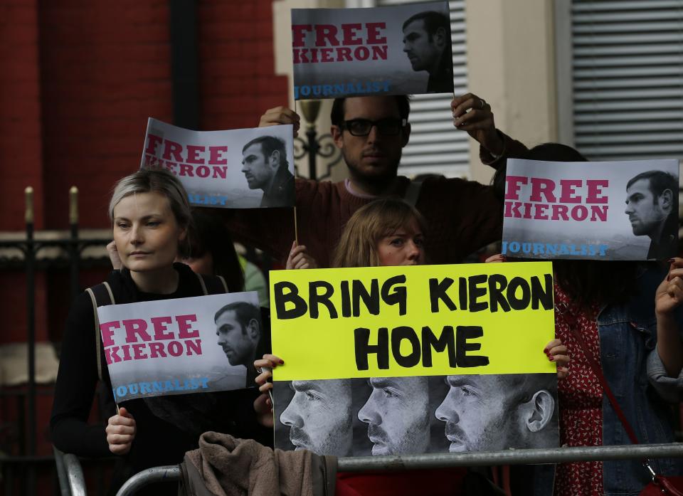 Demonstrators protest against the detention of thirty Greenpeace campaigners, outside the Russian Embassy in London