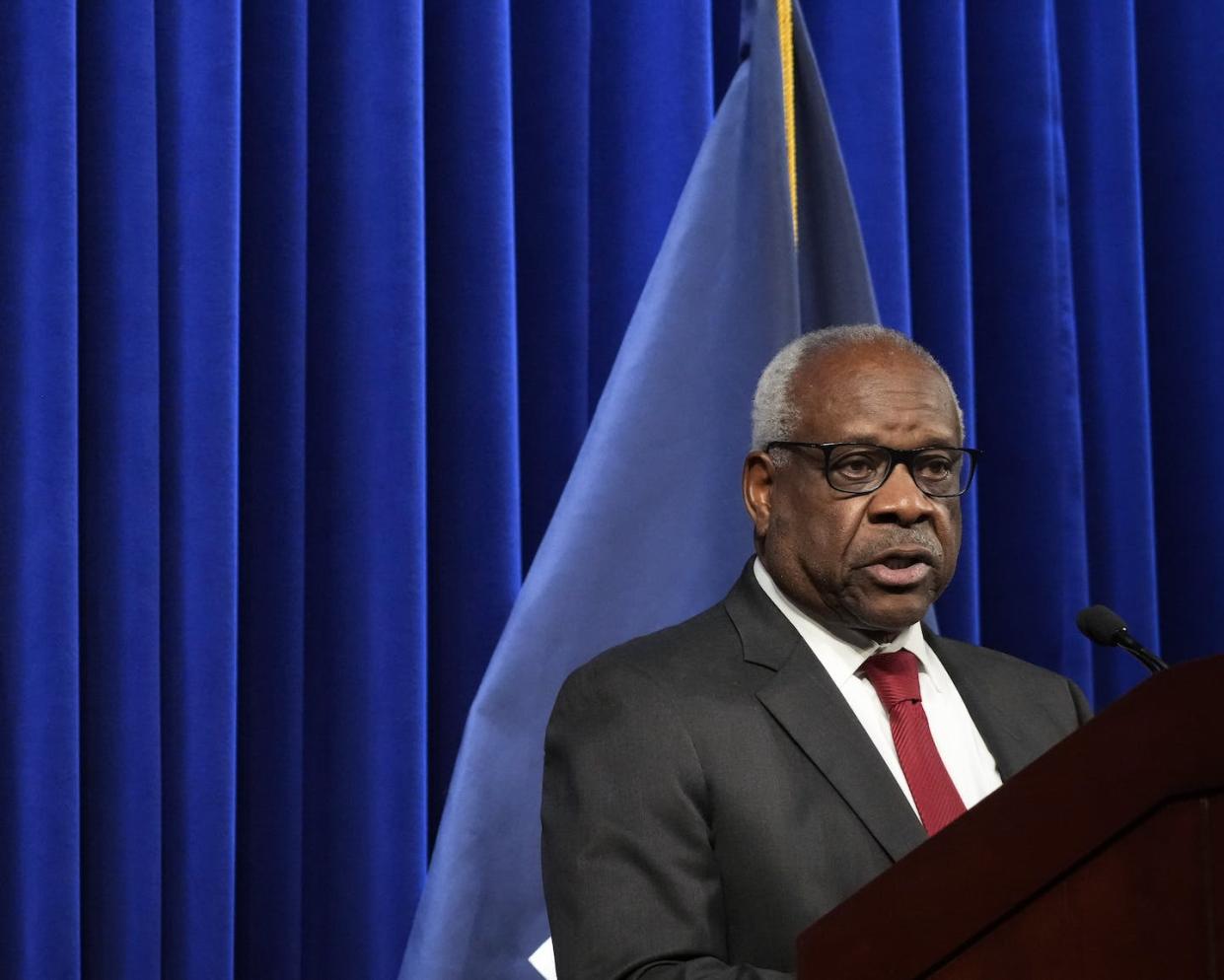Associate Supreme Court Justice Clarence Thomas speaks at the Heritage Foundation in 2021. <a href="https://www.gettyimages.com/detail/news-photo/associate-supreme-court-justice-clarence-thomas-speaks-at-news-photo/1236038291?phrase=us%20supreme%20clarence%20thomas&adppopup=true" rel="nofollow noopener" target="_blank" data-ylk="slk:Drew Angerer/Getty Images;elm:context_link;itc:0;sec:content-canvas" class="link ">Drew Angerer/Getty Images</a>