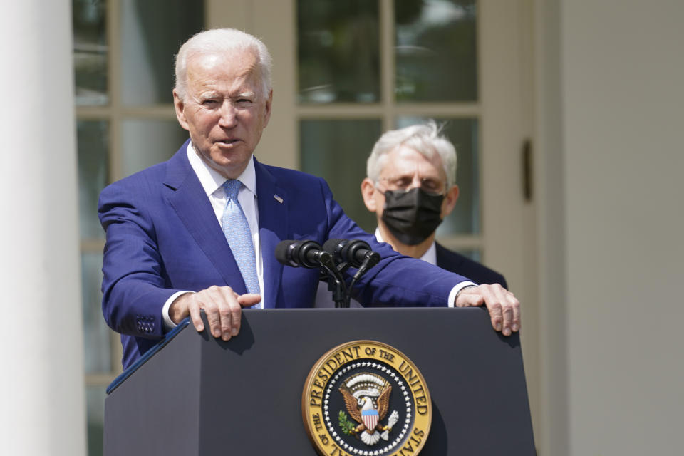 President Joe Biden, accompanied by Attorney General Merrick Garland, speaks about gun violence prevention in the Rose Garden at the White House, Thursday, April 8, 2021, in Washington. (AP Photo/Andrew Harnik)