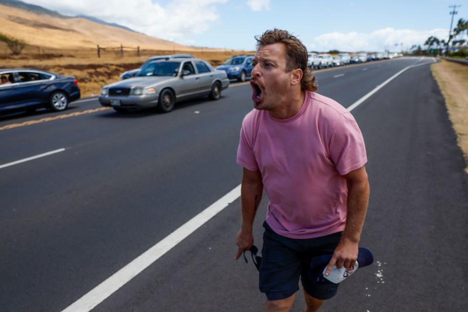 Tempers flared as residents waited in long lines as they are not allowed to pass a checkpoint to return to their homes in  Lahaina.