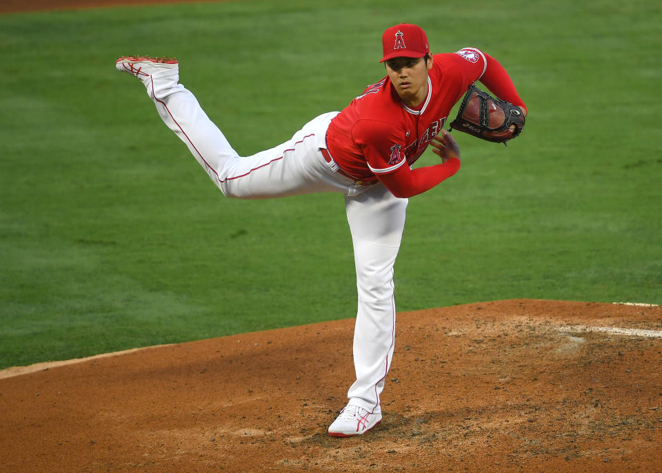 ANAHEIM, CA - JUNE 04: Shohei Ohtani #17 of the Los Angeles Angels pitches in the fourth inning of the game against the Seattle Mariners at Angel Stadium of Anaheim on June 4, 2021 in Anaheim, California. (Photo by Jayne Kamin-Oncea/Getty Images)