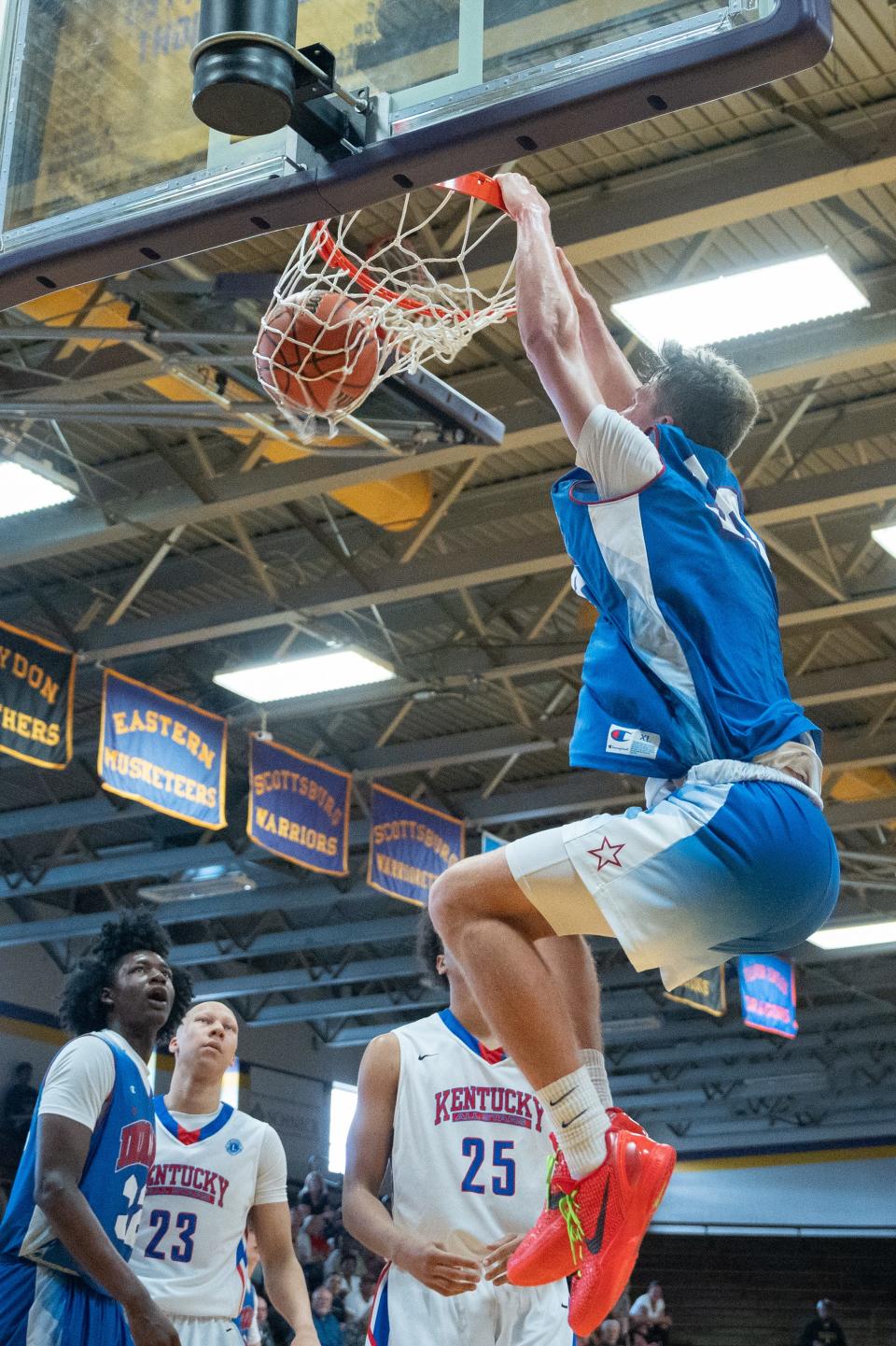 Indiana Junior All-Star Trent Sisley (33) dunks the ball during their game against the Kentucky All-Stars on Sunday, June 2, 2024 in Scottsburg, Ind. at Charles E. Meyer Gymnasium for the first game of the Indiana vs Kentucky All-Stars basketball week.