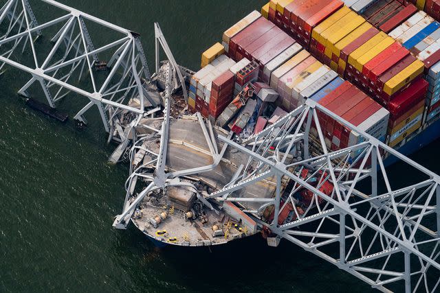 <p>Al Drago/Bloomberg via Getty</p> View of the vessel striking the bridge