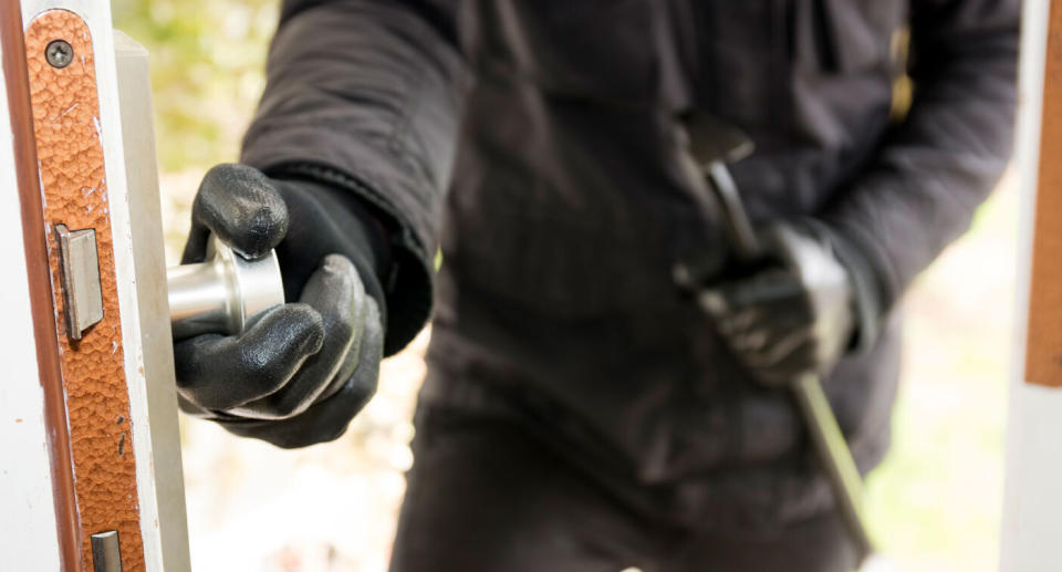 Stock of burglar after breaking into home. 