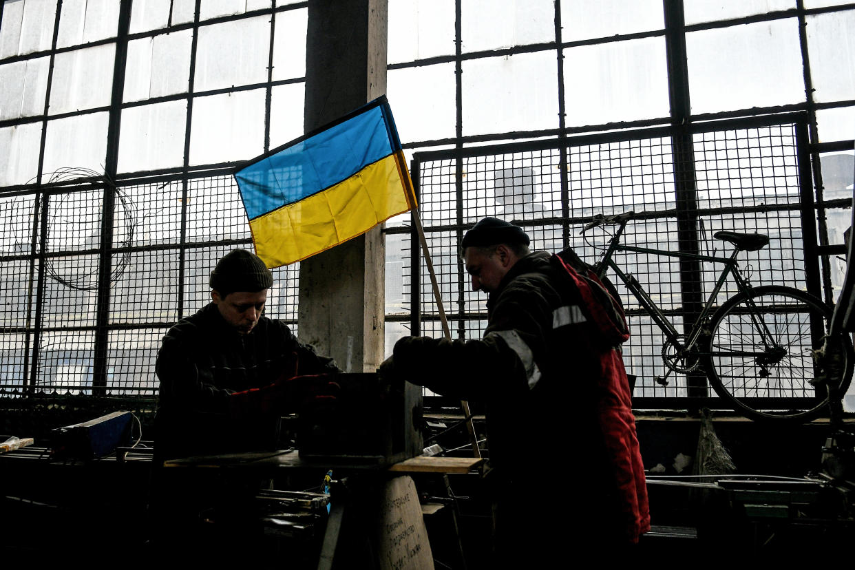 ZAPORIZHZHIA, UKRAINE - MARCH 03, 2022 - People work on the premises of the Defence Centre organized by a local showman, Zaporizhzhia, southeastern Ukraine (Photo credit should read Dmytro Smoliyenko/ Ukrinform/Future Publishing via Getty Images)