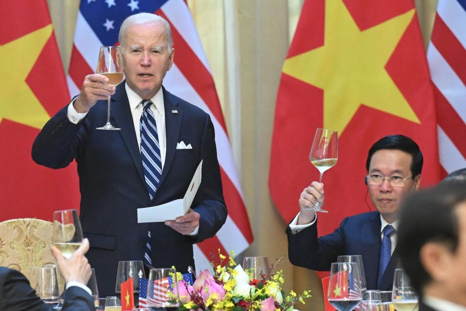 President Joe Biden makes a toast with Vietnam President Vo Van Thuong during a state luncheon at the Presidential Palace in Hanoi on September 11, 2023. <a href="https://www.gettyimages.com/detail/news-photo/president-joe-biden-makes-a-toast-with-vietnams-president-news-photo/1658744518?adppopup=true" rel="nofollow noopener" target="_blank" data-ylk="slk:Saul Loeb/AFP via Getty Images;elm:context_link;itc:0;sec:content-canvas" class="link ">Saul Loeb/AFP via Getty Images</a>