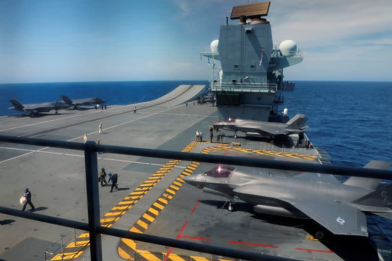 F-35B Lightning II aircrafts are seen on the deck of the HMS Queen Elizabeth aircraft carrier offshore Portugal