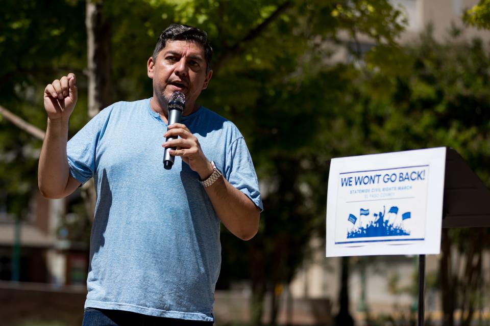 Michael Apodaca speaks at San Jacinto Plaza after members of the Texas Democratic Caucus, local elected officials and community leaders marched April 22 against efforts to turn back diversity, equity and inclusion efforts across Texas.