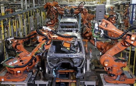 Auto assembly line robots weld on the frame of 2009 Dodge Ram pick-up trucks at the Warren Truck Assembly Plant in Warren, Michigan September 12, 2008. REUTERS/Rebecca Cook