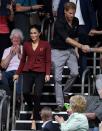 <p>The royal couple watched the USA take home a gold medal against the Netherlands, with the Duchess looking delighted to be cheering on her home country. Photo: AAP </p>