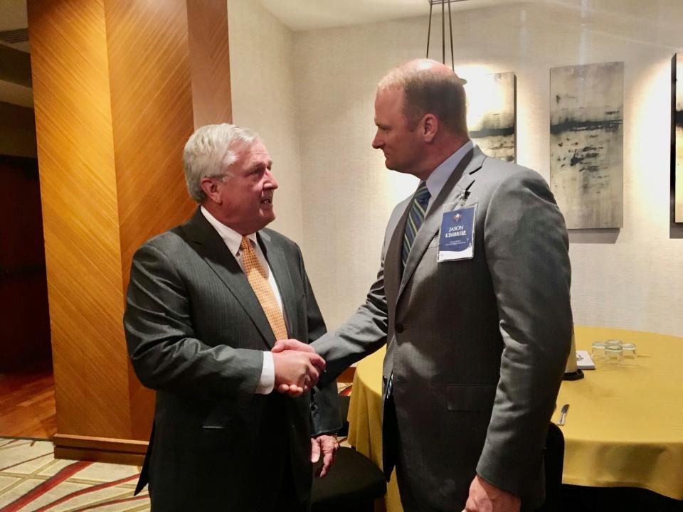 Charles 'Chuck' Hall, HCA's National Group president, greets Jason Kimbrell at an executive training program in Nashville. Kimbrell, now the CEO at Palms West Hospital, told Hall he intended to make a mark on health care. Hall remembered and helped Kimbrell land two jobs with HCA, including the one at Palms West.