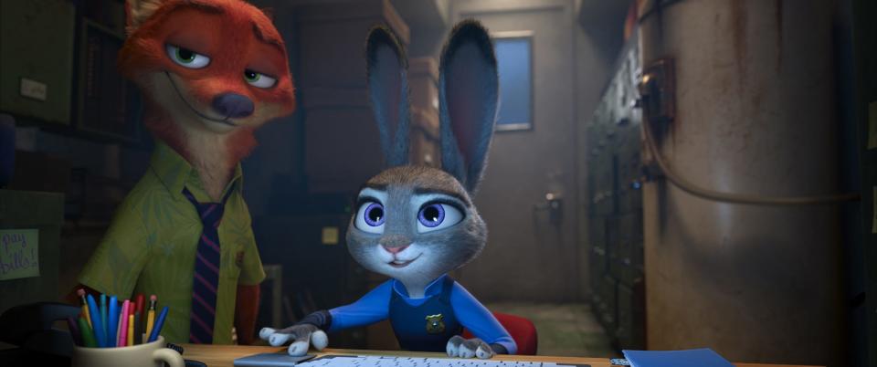 Nick Wilde (left, voiced by Jason Bateman) and Judy Hopps (Ginnifer Goodwin) team up to solve a mystery in the animated film 'Zootopia.'