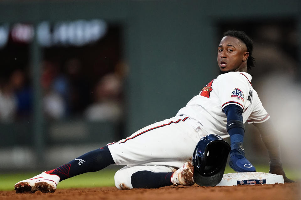 Atlanta Braves' Ozzie Albies steals second base during the third inning of the team's baseball game against the New York Mets on Wednesday, June 30, 2021, in Atlanta. (AP Photo/John Bazemore)