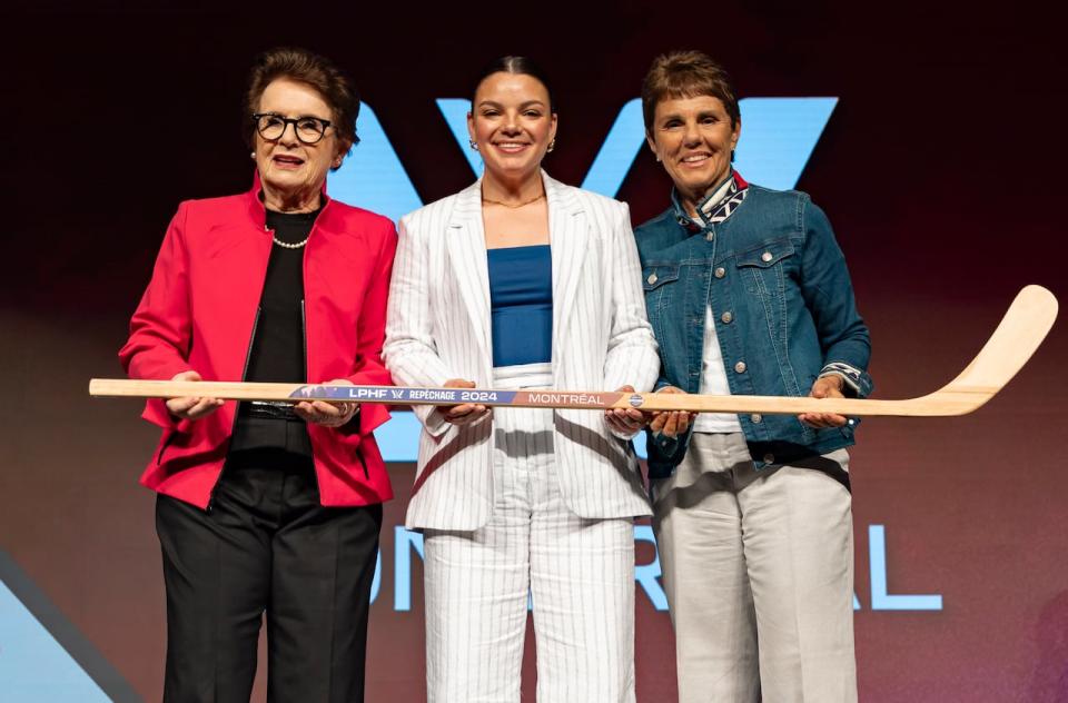 Cayla Barnes, middle, poses with Billie Jean King, left, and Ilana Kloss, right, who are both members of PWHL's advisory board. 