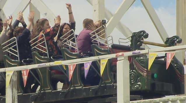 Roller coaster proposal: Craig Keenan pops the question to girlfriend Kylie on a ride at Luna Park. Photo: 7News