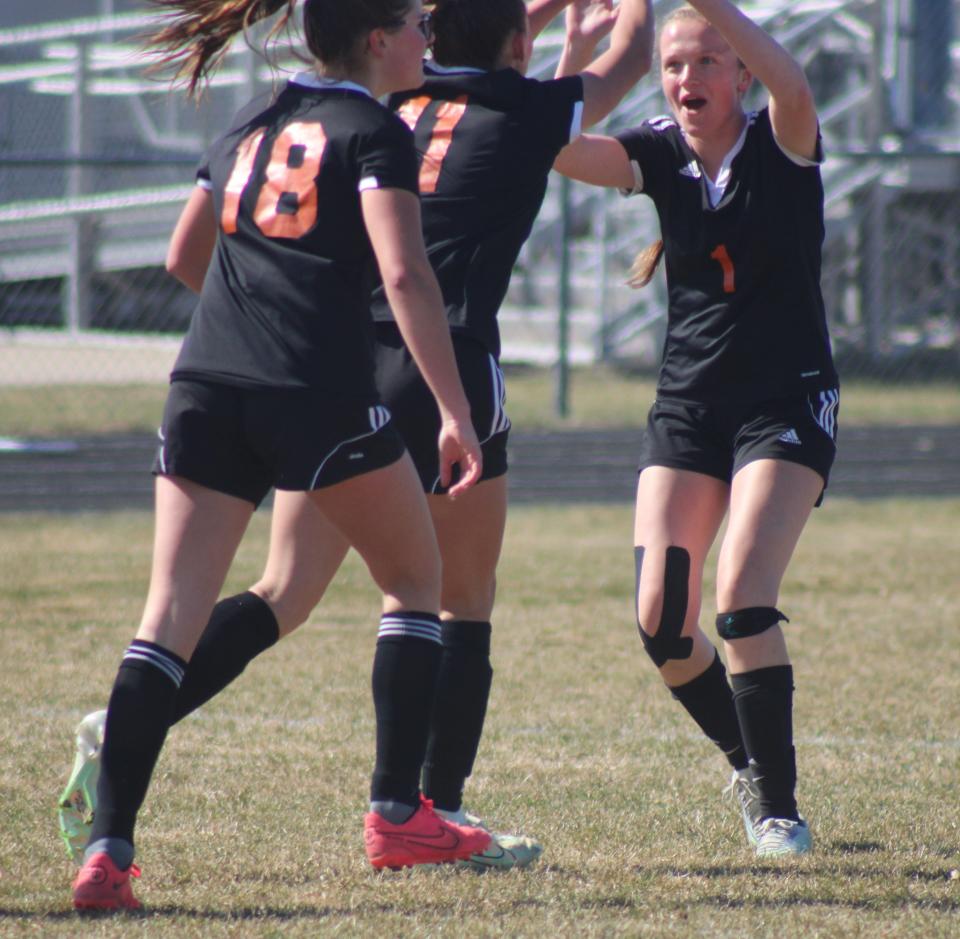 Cheboygan sophomore Addy Baldwin (1) was fired up after freshman Jaelyn Wheelock (11) put the Chiefs up 1-0 over Clare with a goal just over six minutes into the first half on Friday.