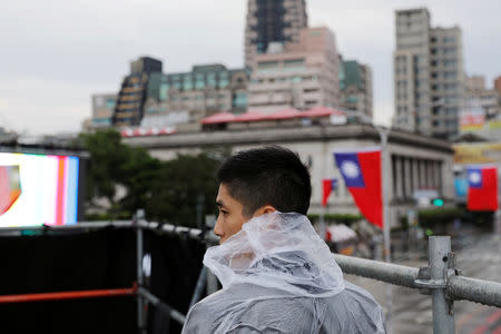 A policeman stands guard before the National Day celebrations in Taipei, Taiwan October 10, 2018. REUTERS/Tyrone Siu