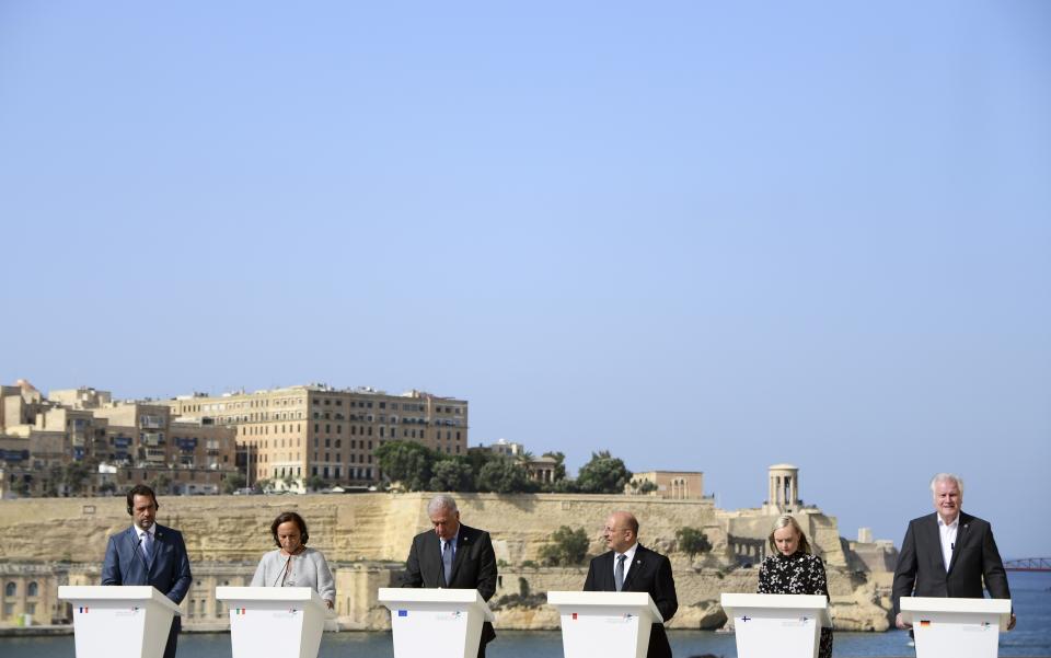 From left; French Interior Minister Christophe Castaner, Italian Interior Minister Luciana Lamorgese, EU commissioner for migration Dimitris Avramopoulos, Maltese Interior Minister Michael Farrugia, Finnish Interior Minister Maria Ohisalo and German Interior Minister Horst Seehofer give a joint press conference at the end of an informal meeting of EU interior ministers, at Fort St. Angelo, in Birgu, Malta, Monday, Sept. 23, 2019. Five European Union nations have agreed to a temporary arrangement to take in migrants rescued from the central Mediterranean Sea. (AP Photo/Jonathan Borg)
