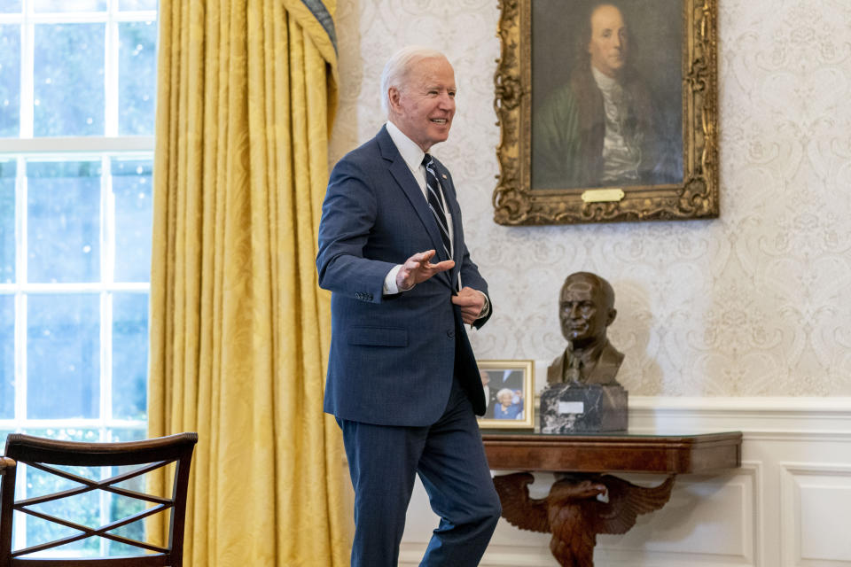 President Joe Biden leaves after signing the American Rescue Plan, a coronavirus relief package, in the Oval Office of the White House, Thursday, March 11, 2021, in Washington. (AP Photo/Andrew Harnik)