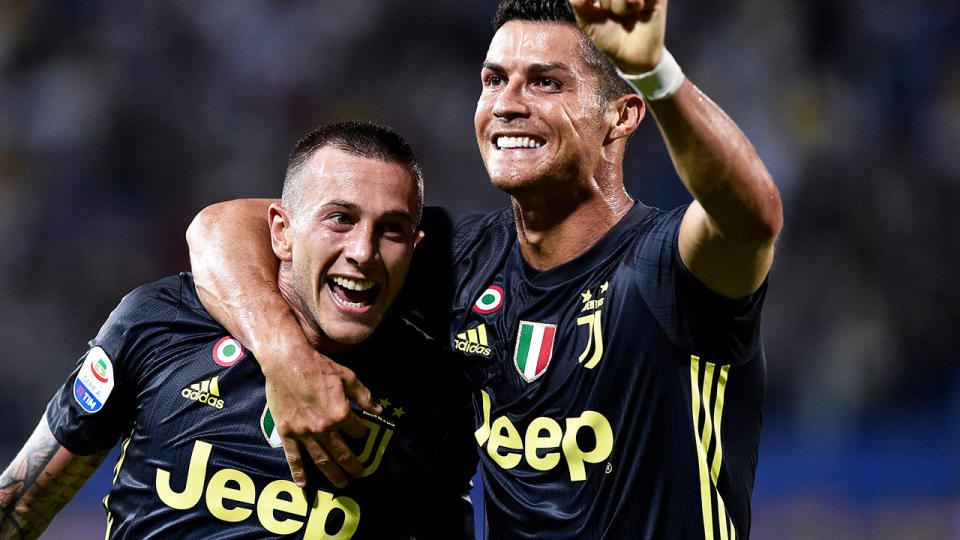 Federico Bernardeschi celebrates with Cristiano Ronaldo. (Photo by Giuseppe Maffia/NurPhoto via Getty Images)