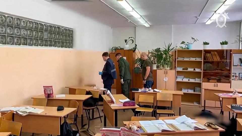 Investigators work at the scene of a shooting by Alina Afanaskina in a classroom of a school in Bryansk, Russia, in December (Russian Investigative Committee)