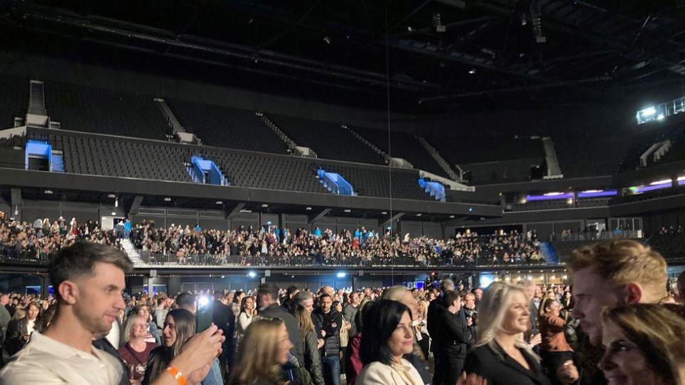 Shot showing crowds with empty seating areas at Co-op Live