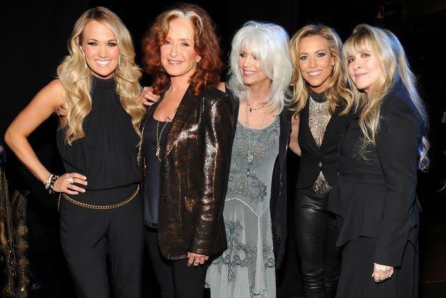 <p>Kevin Mazur/WireImage</p> Sheryl Crow with Carrie Underwood, Bonnie Raitt, Emmylou Harris and Stevie Nicks at the Rock & Roll Hall of Fame induction in 2014.