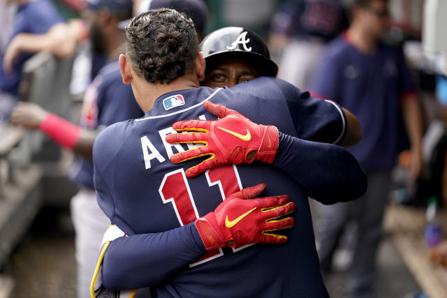 Reds' 12-game winning streak ends as Braves prevail 7-6 in 8-homer