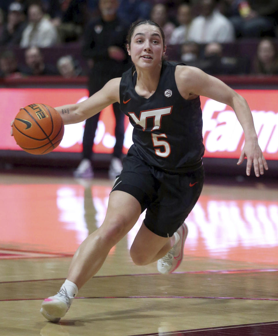 Virginia Tech's Georgia Amoore (5) dribbles during the first half of an NCAA college basketball game against Syracuse in Blacksburg, Va., Thursday, Feb. 2, 2023. (Matt Gentry/The Roanoke Times via AP)