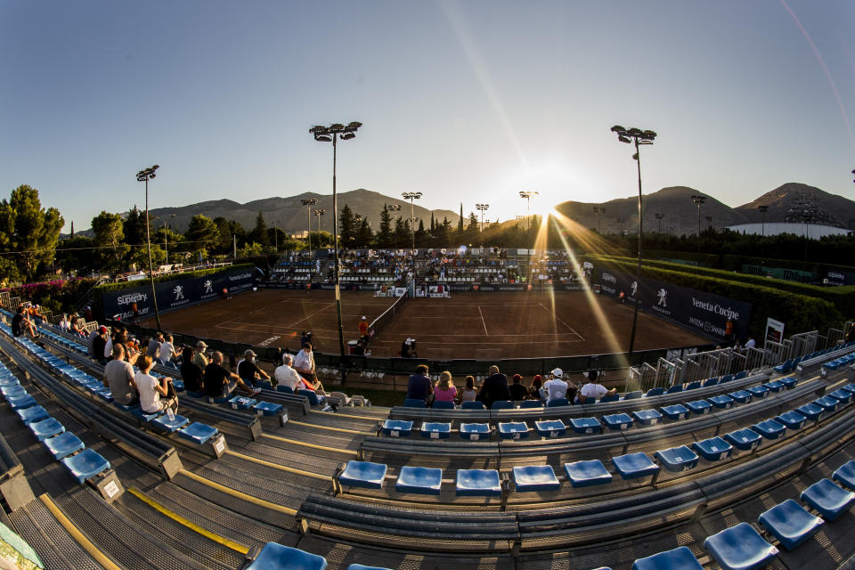 A view of the central court during Palermo Ladies Open tennis tournament in Palermo, Italy, Thursday, Aug. 6, 2020. Tour-level tennis resumed after a five-month enforced break and players at the Palermo Ladies Open had to handle their own towels and not shake hands of opponents. The strict rules because of the coronavirus included no showers on site, and no autographs or photos with fans. Players in the singles main draw come from 15 countries, all in Europe. (Palermo Ladies Open via AP)