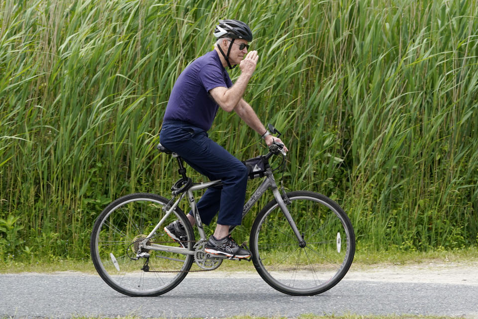 President Joe Biden, with first lady Jill Biden, not shown, takes a bike ride in Rehoboth Beach, Del., Thursday, June 3, 2021. The Biden's are spending a few days in Rehoboth Beach to celebrate first lady Jill Biden's 70th birthday. (AP Photo/Susan Walsh)