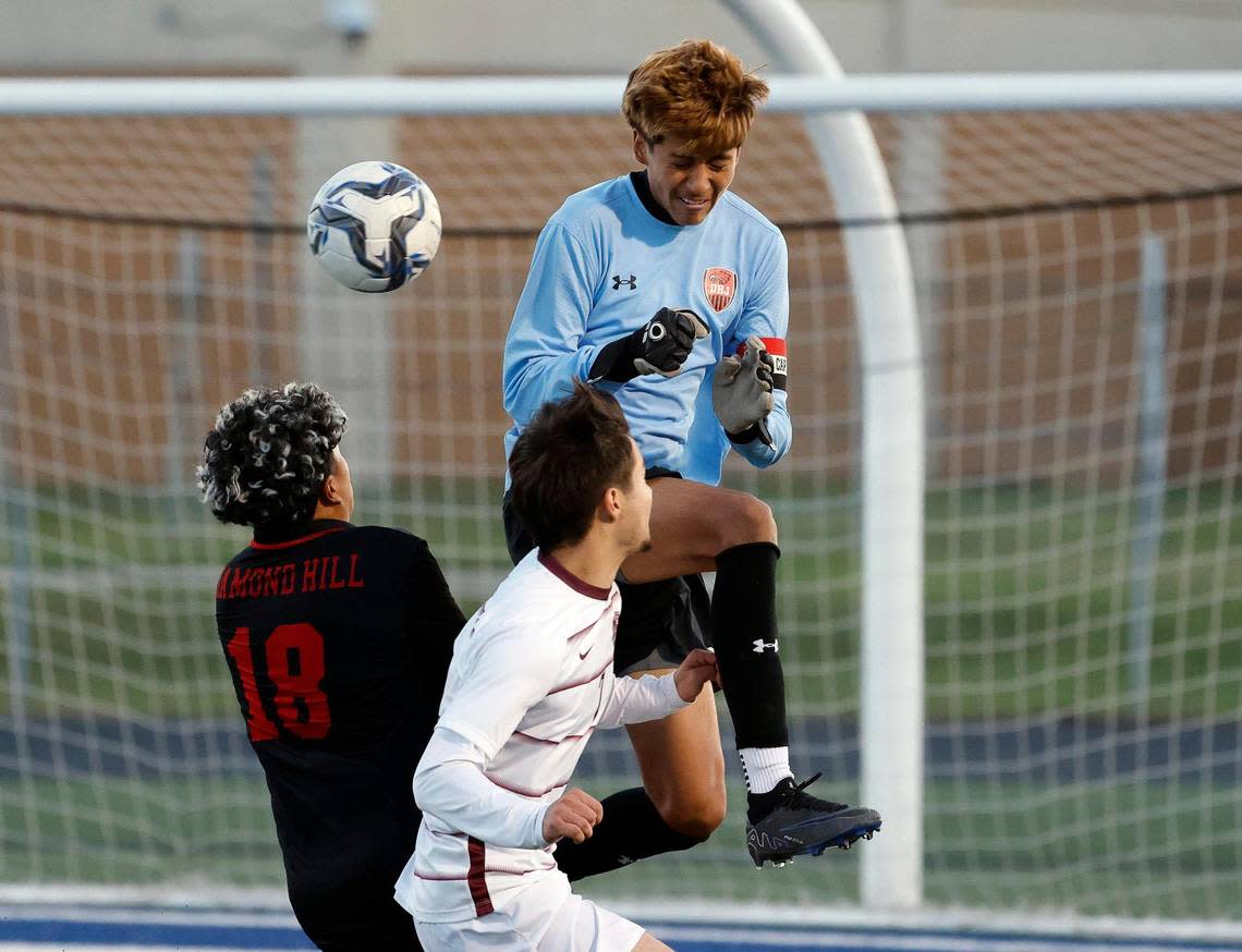 Bridgeport’s David Kranz undercuts Diamond Hill-Jarvis’ keeper Reyes Medina during a UIL Class 4A Regional Quarterfinal soccer game at Kangaroo Stadium in Weatherford Texas, Tuesday Apr 02, 2024. Diamond Hill led 2-0 at the half. Bob Booth/Special to the Star-Telegram