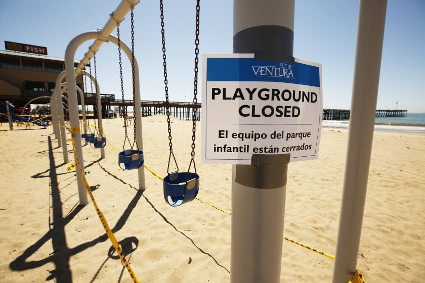 VENTURA, CA - APRIL 15: Ventura Promenade Beach Playground is closed as Ventura City has closed its parks, beach and pier on Wednesday morning as the sunshine and warm temperatures brought people to the beach despite warnings about the coronavirus Covid-19 pandemic. Ventura on Wednesday, April 15, 2020 in Ventura, CA. (Al Seib / Los Angeles Times)