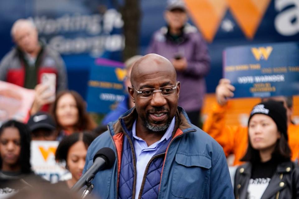 Democratic Sen. Raphael Warnock speaks during an election day canvass launch on Tuesday, Dec. 6, 2022, in Norcross, Ga. Sen. Warnock is running against Republican candidate Herschel Walker in a runoff election. (AP Photo/Brynn Anderson)