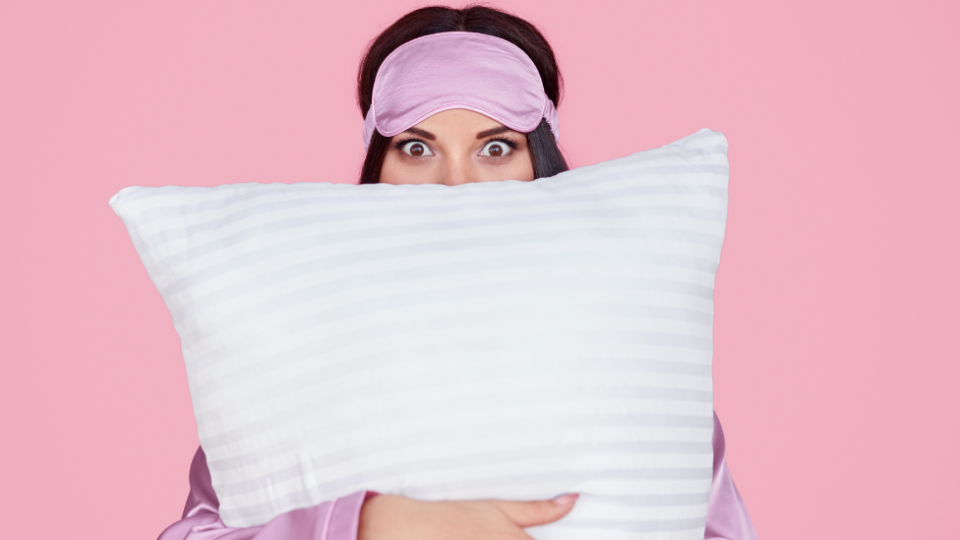 A pregnancy pillow may be the key to a better night's sleep, regardless of whether you're expecting. Photo: Getty