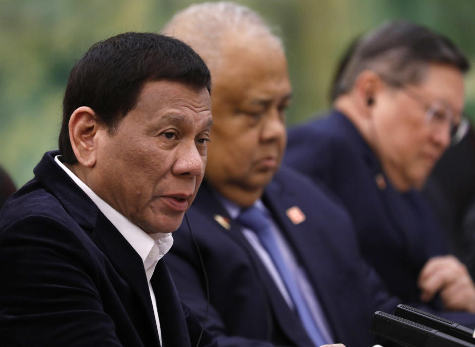 Philippine President Rodrigo Duterte (L) speaks to Chinese Premier Li Keqiang (not pictured) during their meeting at the Great Hall of the People on August 30, 2019 in Beijing, China.  (How Hwee Young-Pool/Getty Images)