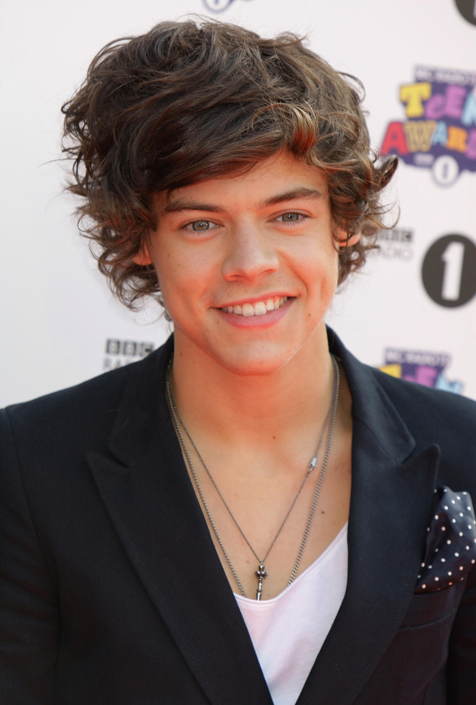 <p>Girls globally were devastated when Styles cut off his mop of curls. The One Direction star was hugely well known for his thick head of hair – here’s hoping it will be back one day. [Photo: PA] </p>