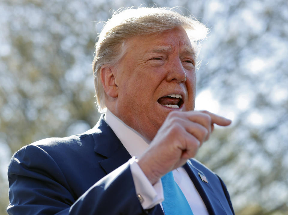 President Donald Trump speaks to members of the media on the South Lawn of the White House in Washington, before boarding Marine One helicopter, Wednesday, April 10, 2019. (AP Photo/Pablo Martinez Monsivais)