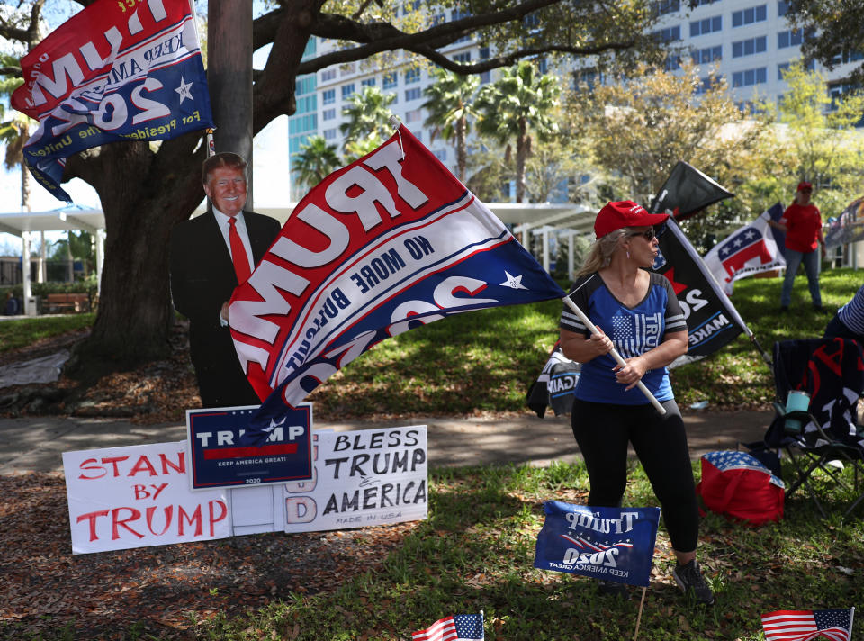 Before he took the stage inside at the Conservative Political Action Conference, supporters of former President Donald Trump stood outside the Hyatt Regency on Sunday. (Photo: Joe Raedle/Getty Images)