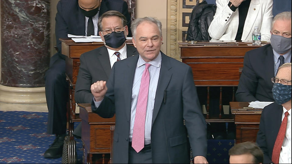 In this image from video, Sen. Tim Kaine, D-Va., speaks as the Senate reconvenes after protesters stormed into the U.S. Capitol on Wednesday, Jan. 6, 2021. (Senate Television via AP)