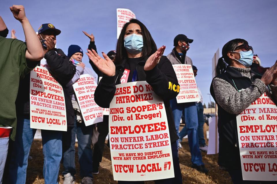 Kim Cordova, president of United Food and Commercial Workers Local 7, center, leads the rally during the strike against King Soopers at Glendale, Colo., in January 2022.