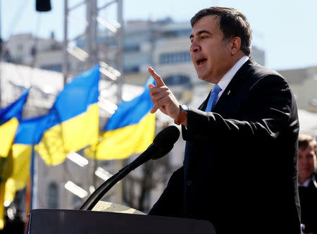 FILE PHOTO: Former Georgian president Mikhail Saakashvili addresses members of a Batkivshchyna party during a meeting in central Kiev, March 29, 2014. REUTERS/Gleb Garanich/File Photo