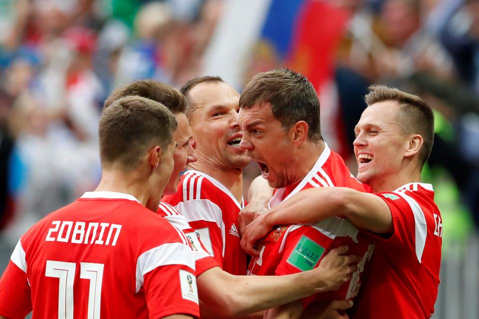 <p>Artem Dzyuba of Russia celebrates after scoring his sides third goal during the 2018 FIFA World Cup Russia group A match between Russia and Saudi Arabia at Luzhniki Stadium on June 14, 2018 in Moscow, Russia. (RUSSIA SOCCER FIFA WORLD CUP, Russia, Saudi Arabia, Moscow). </p>