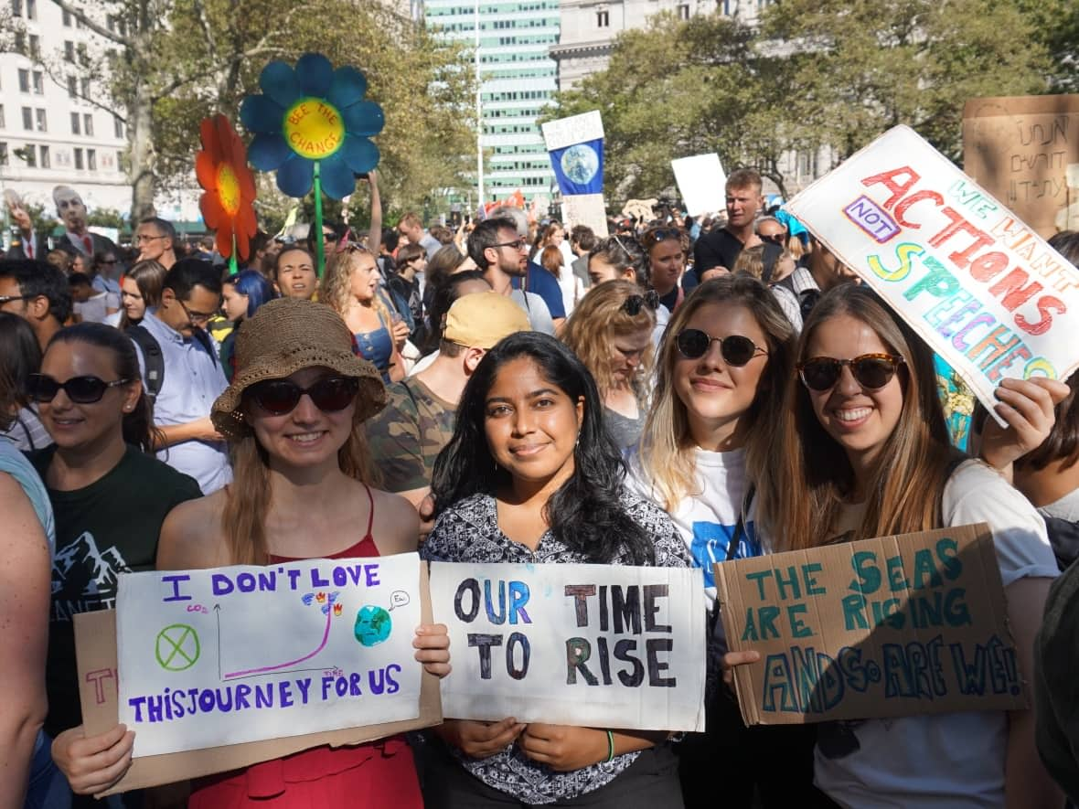 Shakti Ramkumar, centre, shown during a climate strike demonstration, says her activism began with her family's move from India to Surrey, B.C., when she was eight years old. She'll be at the UN's COP26 climate change summit that starts Sunday in Glasgow.  (Submitted by Shakti Ramkumar - image credit)