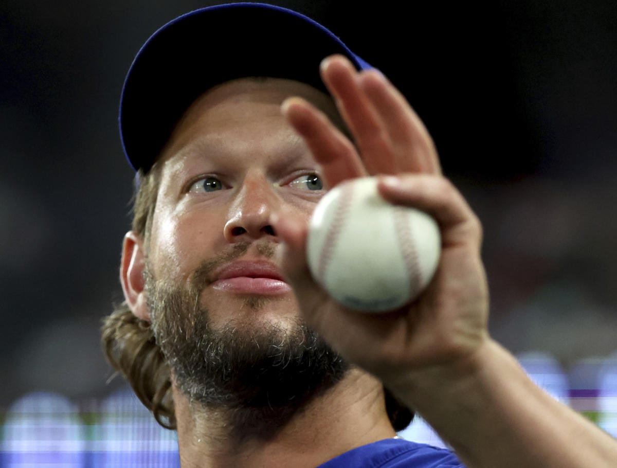 Clayton Kershaw throws a bullpen session as he works toward return