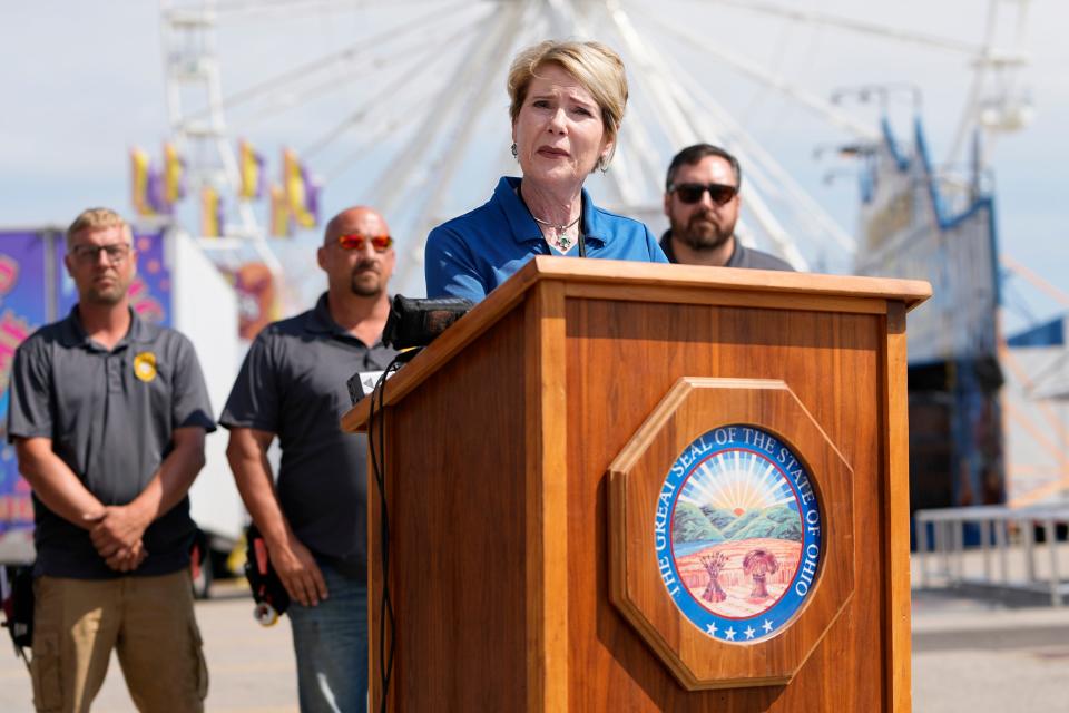 Dorothy Pelanda, Ohio Department of Agriculture director, speaks about Tyler's Law and what it means for ride inspections and safety procedures during a press conference at the Ohio State Fair on Monday. The law is named for Tyler Jarrell, who died in 2017 after being involved in a ride accident at the fair.