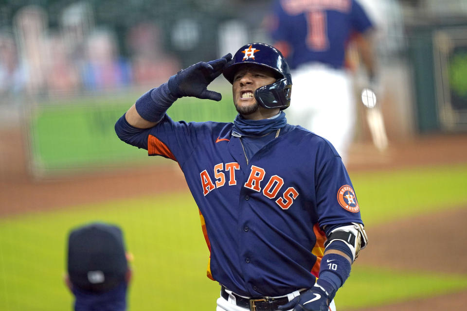 Houston Astros' Yuli Gurriel celebrates after hitting a home run against the Seattle Mariners during the fourth inning of a baseball game Saturday, Aug. 15, 2020, in Houston. (AP Photo/David J. Phillip)