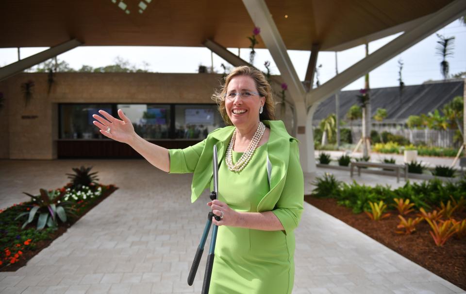 Selby Gardens President and CEO Jennifer Rominiecki leads guests to the new welcome center.