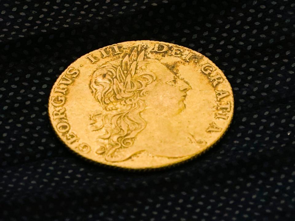 Shown is a King George III gold guinea, discovered in an excavation site at the Red Bank Battlefield Park in National Park, N.J., Tuesday, Aug. 2, 2022.