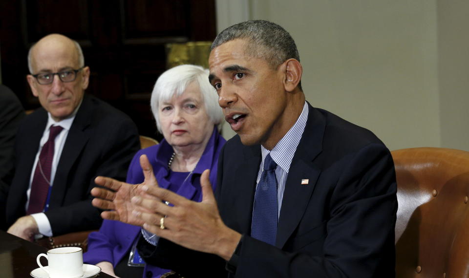 U.S. President Barack Obama holds a meeting with financial regulators to receive an update on their progress in implementing Wall Street at the White House in Washington March 7, 2016.  With Obama are Timothy Massad (L),  Chairman of the United States Commodity Futures Trading Commission (CFTC) and U.S. Federal Reserve Chair Janet Yellen (C). REUTERS/Kevin Lamarque